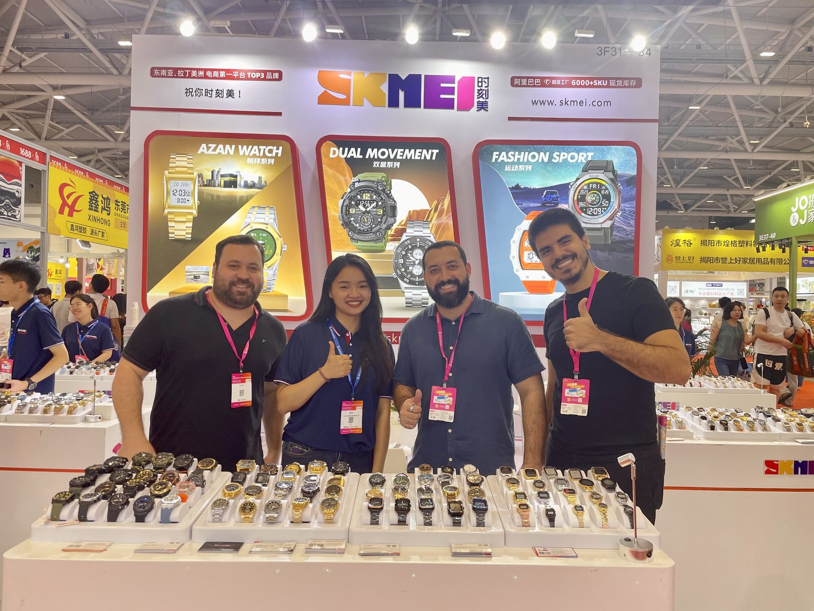 Overseas buyers with the SKMEI team behind the watch counter at the 2024 Shenzhen show