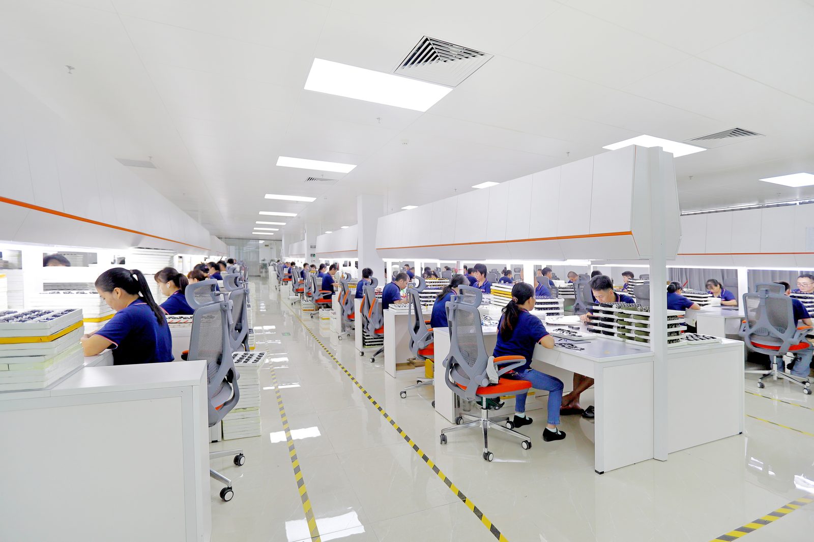 SKMEI watch assembly hall with workers at production benches in the new C6 plant